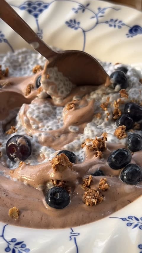 Instagram post by @cozyrecipe for Bob's Red Mill. Caption reads: chia pudding parfait 🫐 🍫 

Here’s an idea for....