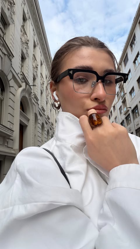 Instagram post by @milanalavv for Vooglam. Caption reads: The right eyewear changes everything @vooglam 🧡 I....