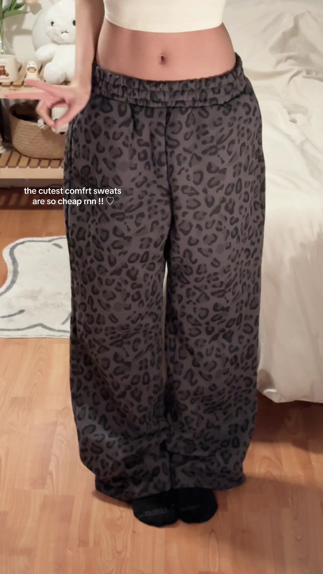 TikTok post by @secret_chaar for Comfrt. Caption reads: comfrt leopard print sweats >> #comfrt [...].