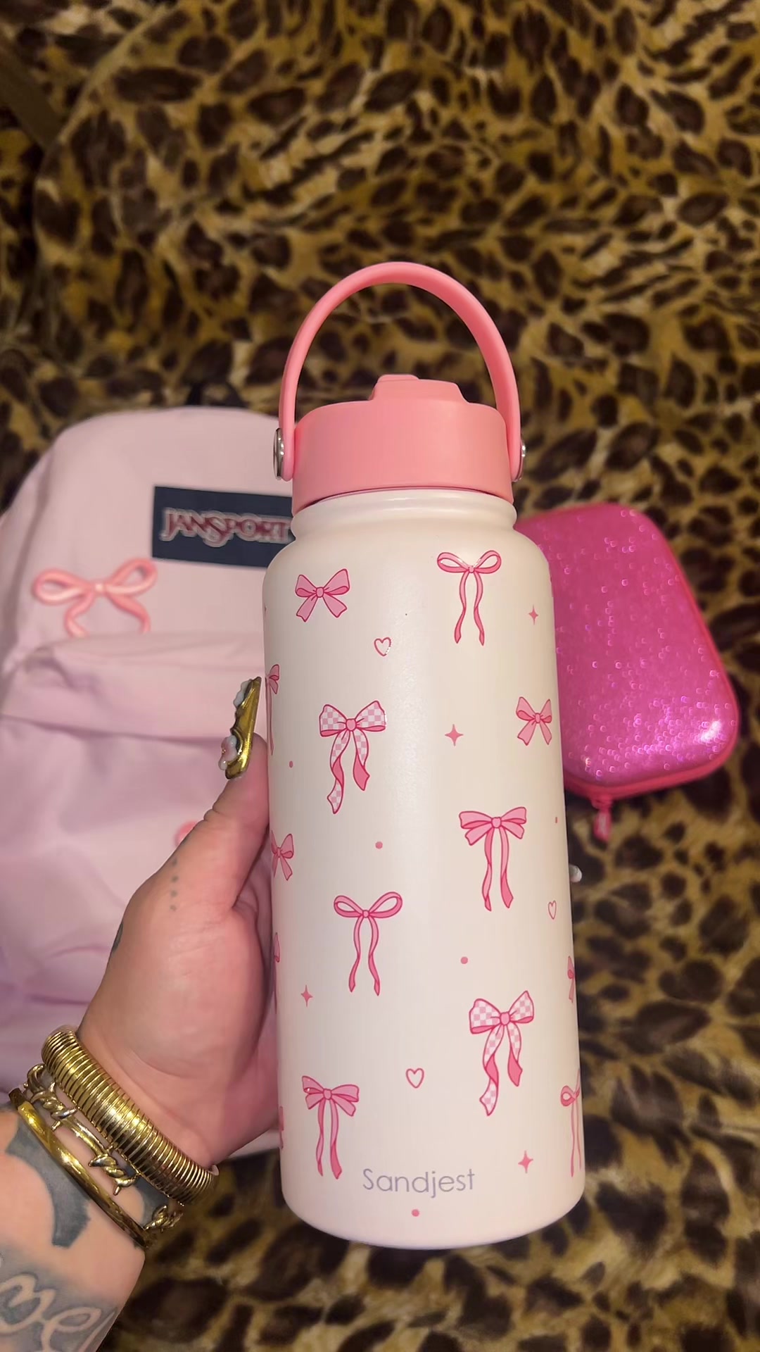 TikTok post by @alisasdreamworld for Sandjest. Caption reads: @SANDJEST #backtoschoolshopping #bows [...].