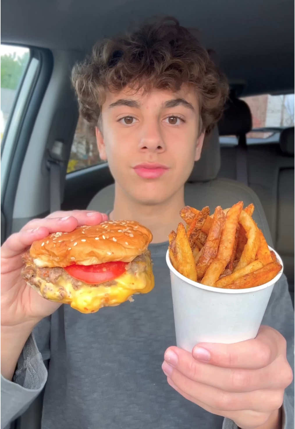 TikTok post by @derekeatsss for OLIPOP. Caption reads: Five guys 🍔 @OLIPOP #olipoppartner #fiveguys....