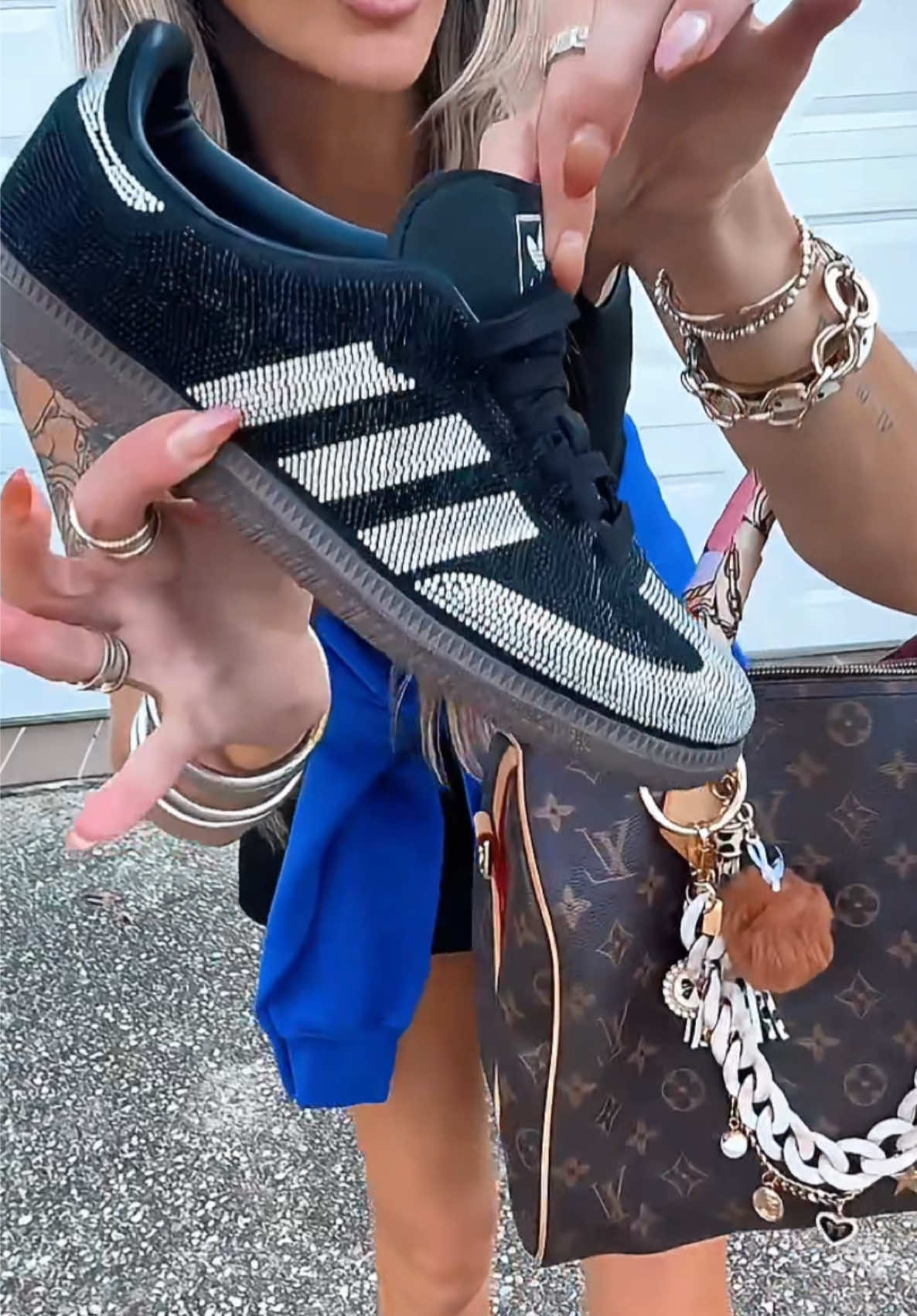 TikTok post by @adrianegweyn for Fly Kicks. Caption reads: [...] #ViralSneakers #SneakerTok @Fly Kicks.