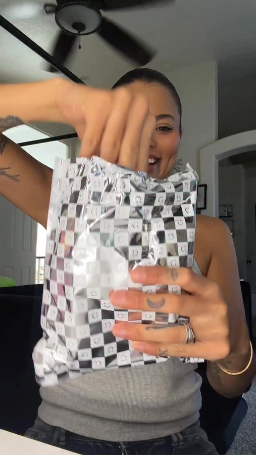 Instagram post by @simplynessa15 for MINISO USA. Caption reads: Opening the NEW HELLO KITTY POPSTAR VINYL PLUSHIES....