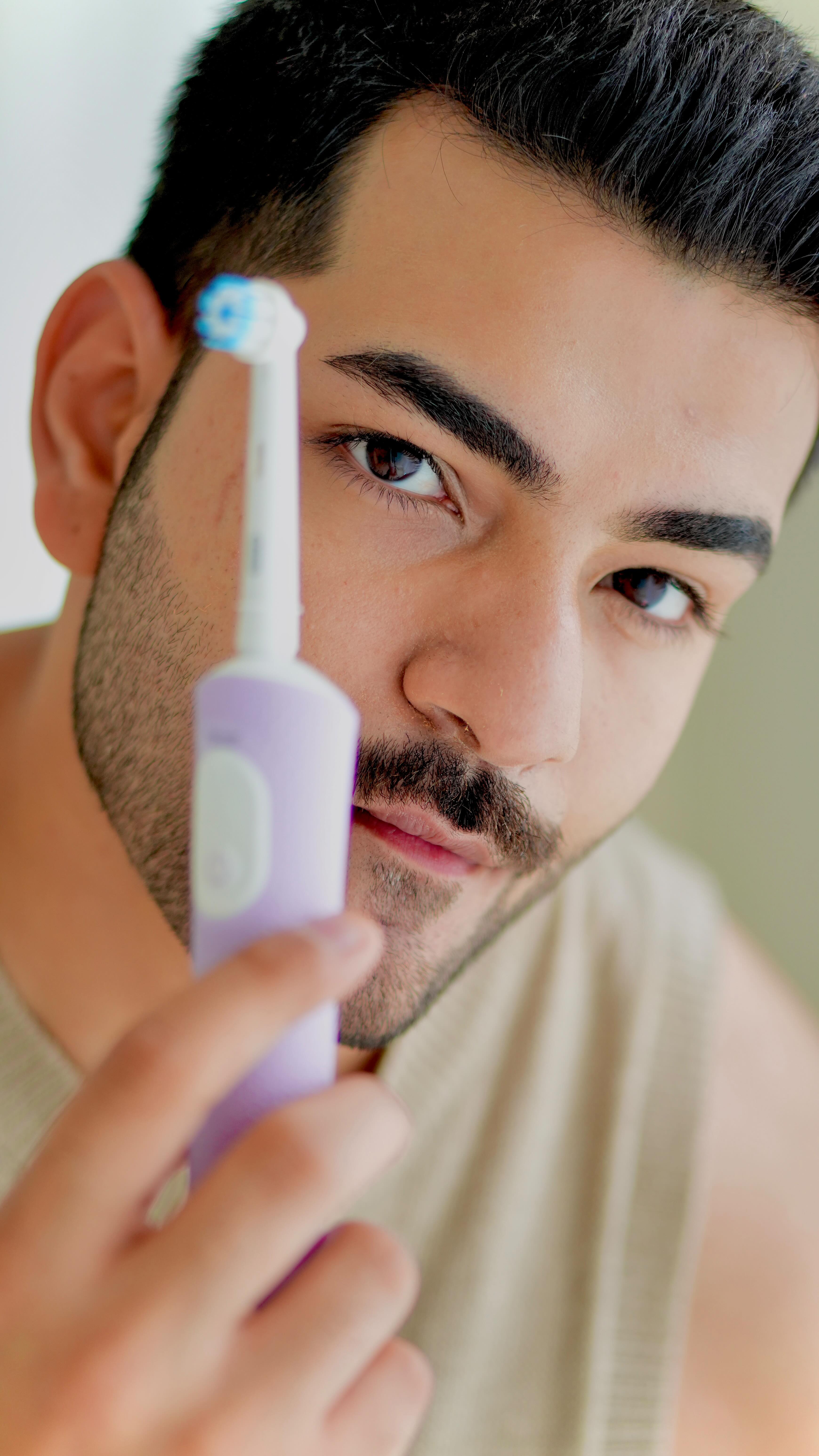 Instagram post by @chakitchawla for Oral-B. Caption reads: Still using a manual toothbrush? 👀 Once you feel....