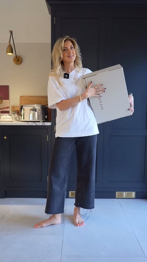 Instagram post by @carasuthers for ALLSAINTS. Caption reads: A little @allsaints unboxing and some boots of....