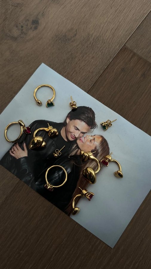 Instagram post by @aresaixala for TOUS. Caption reads: My favorite accessory today: loveeee @tousjewelry....