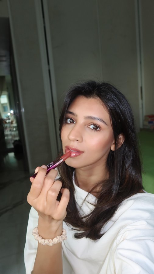 Instagram post by @rithink_skin for Typsy Beauty. Caption reads: Okay but why does this gloss make me feel ten....