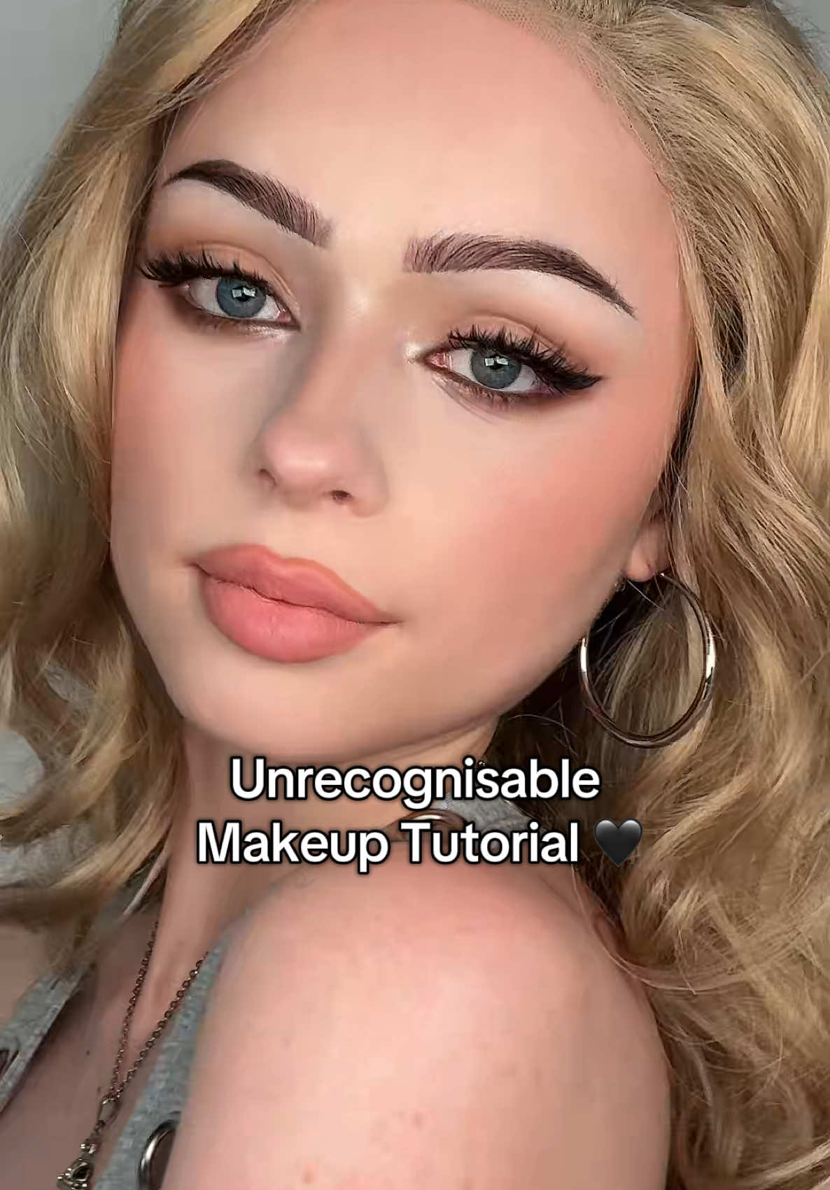 TikTok post by @s.ophiegracee for DearDahlia. Caption reads: UNRECONISABLE makeup tut 🖤 #makeuptutorial #fypシ゚....