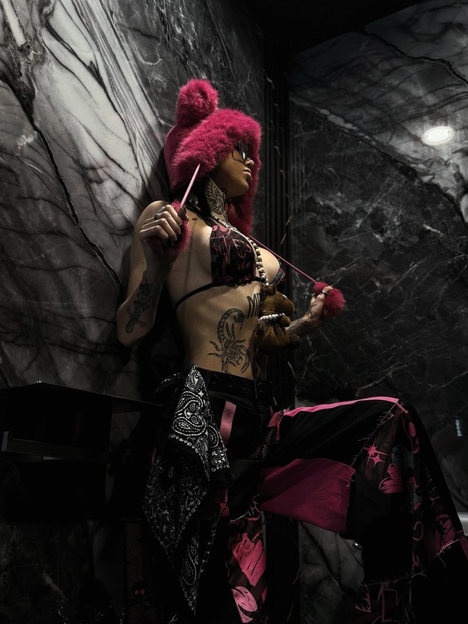 Instagram post by @morguemuscle for iHeartRaves. Caption reads: this new collab with @fizzipopmusic & @iheartraves....