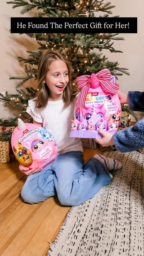 Instagram post by @theclassymamabear for ZURU Toys. Caption reads: 🩷Her brother couldn't wait to give her the new....