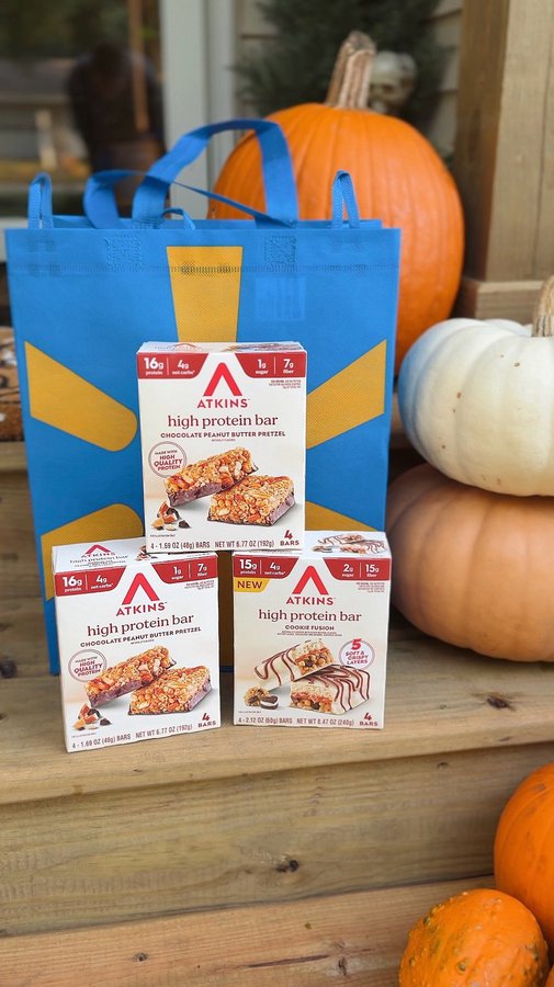 Instagram post by an influencer for Atkins. Caption reads: #ad I’ve been buying these Atkins bars at Walmart....