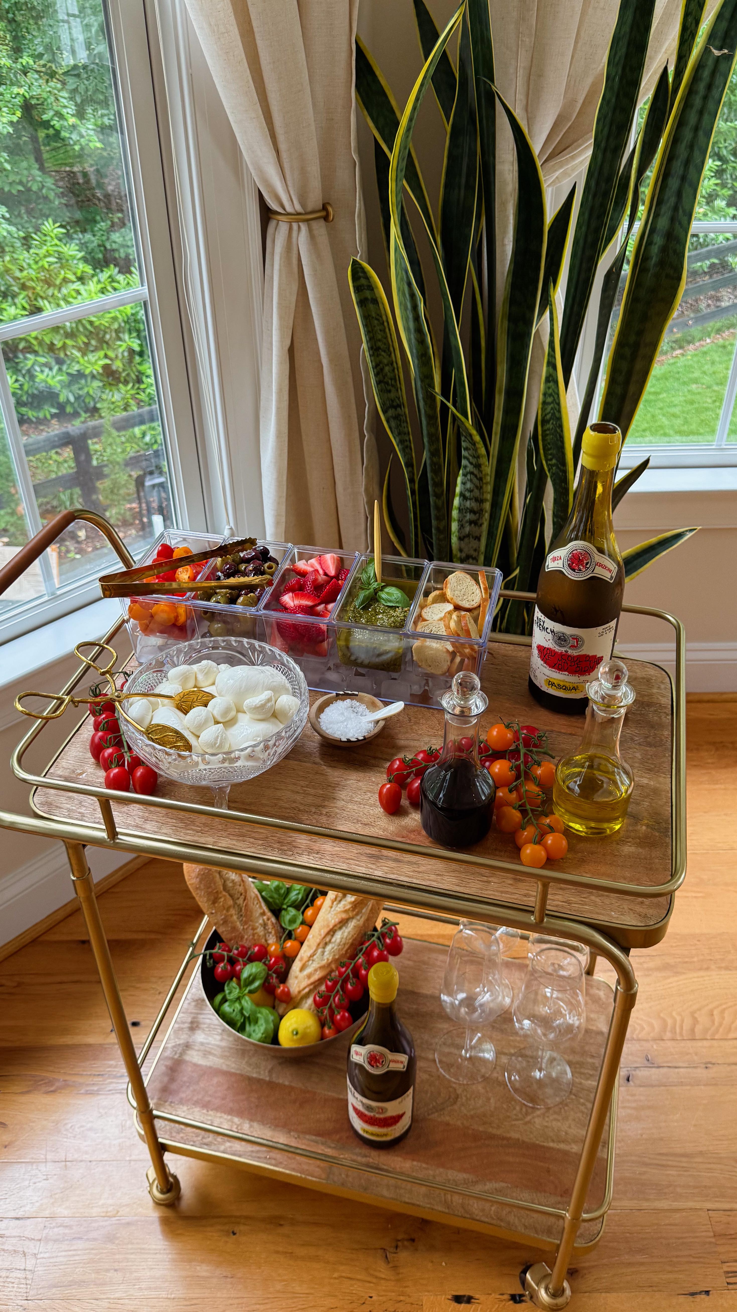 Instagram post by @carolyncoving for WineEnthusiast. Caption reads: Burrata Bar with @PasquaWines 🥂

Impress your....