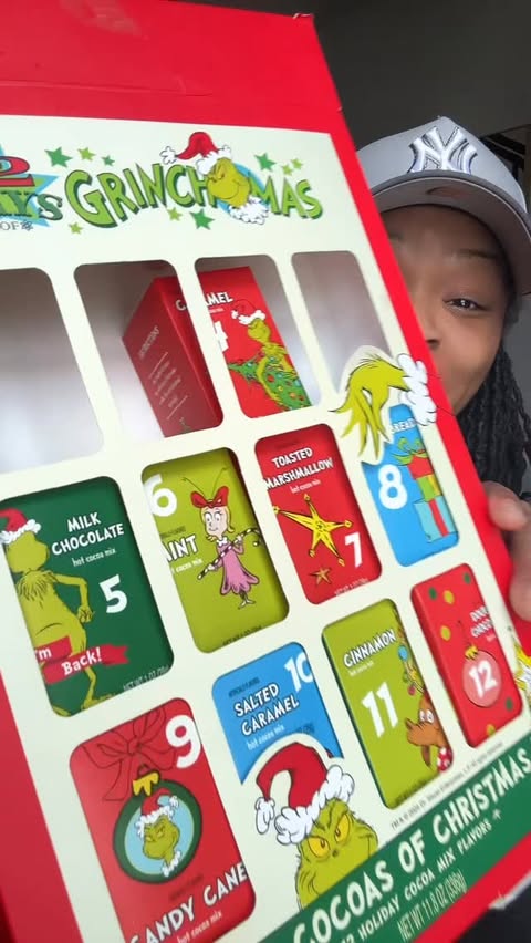 Instagram post by @munchwithdes for Five Below. Caption reads: 12 Days of GrinchMas Hot Chocolate Advent Calendar....