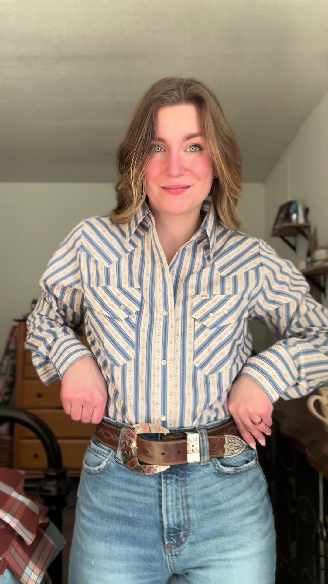 TikTok post by @cowgirlinspurs for Ely Cattleman. Caption reads: @Ely Cattleman has the best pearlsnaps for the....