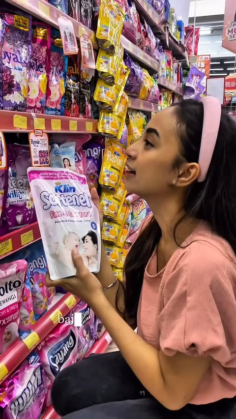 Instagram post by @angginifebrida for Alfamart. Caption reads: Pakaian wangi dan rapih itu penting banget! Aku....