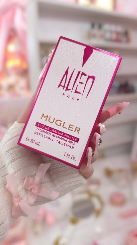 Instagram post by @glamfragranceaddict for Mugler. Caption reads: [...] the most addictive fruity luxury from....