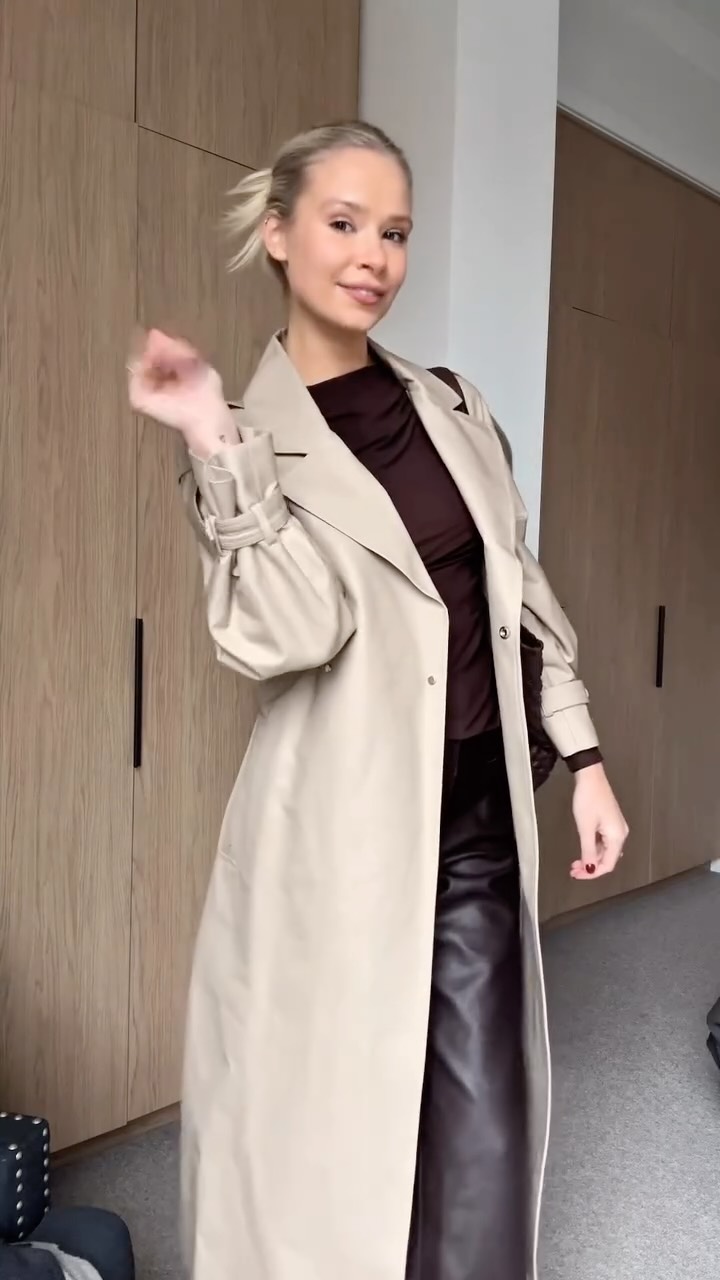 Instagram post by @annalisedalins_ for Witchery. Caption reads: Trench coats are where it’s at! 🤍....