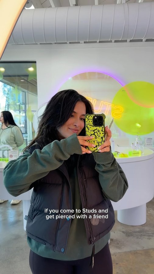 Instagram post by @jazminegarcia for Studs. Caption reads: come with me & my bestie to get pierced @studs !!....