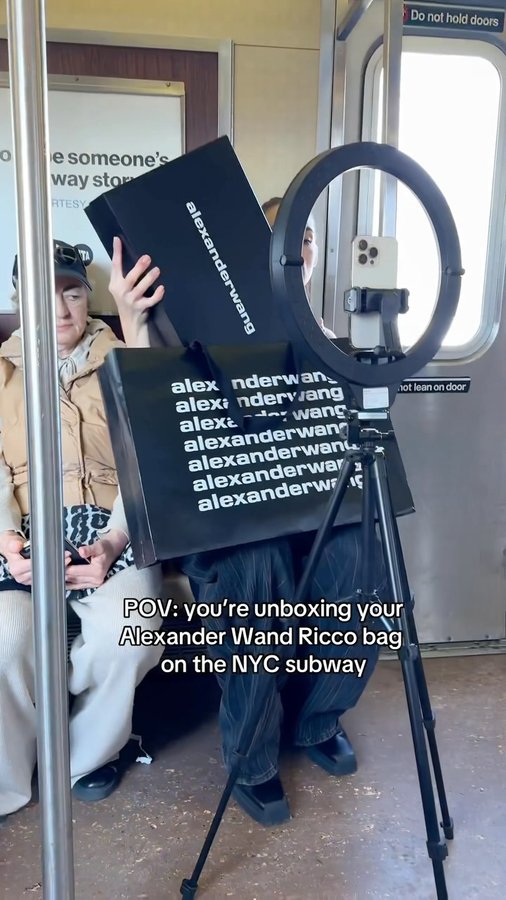 Instagram post by @yulia_hayek for alexanderwang. Caption reads: [...] back in stock on Wednesday 5/22....