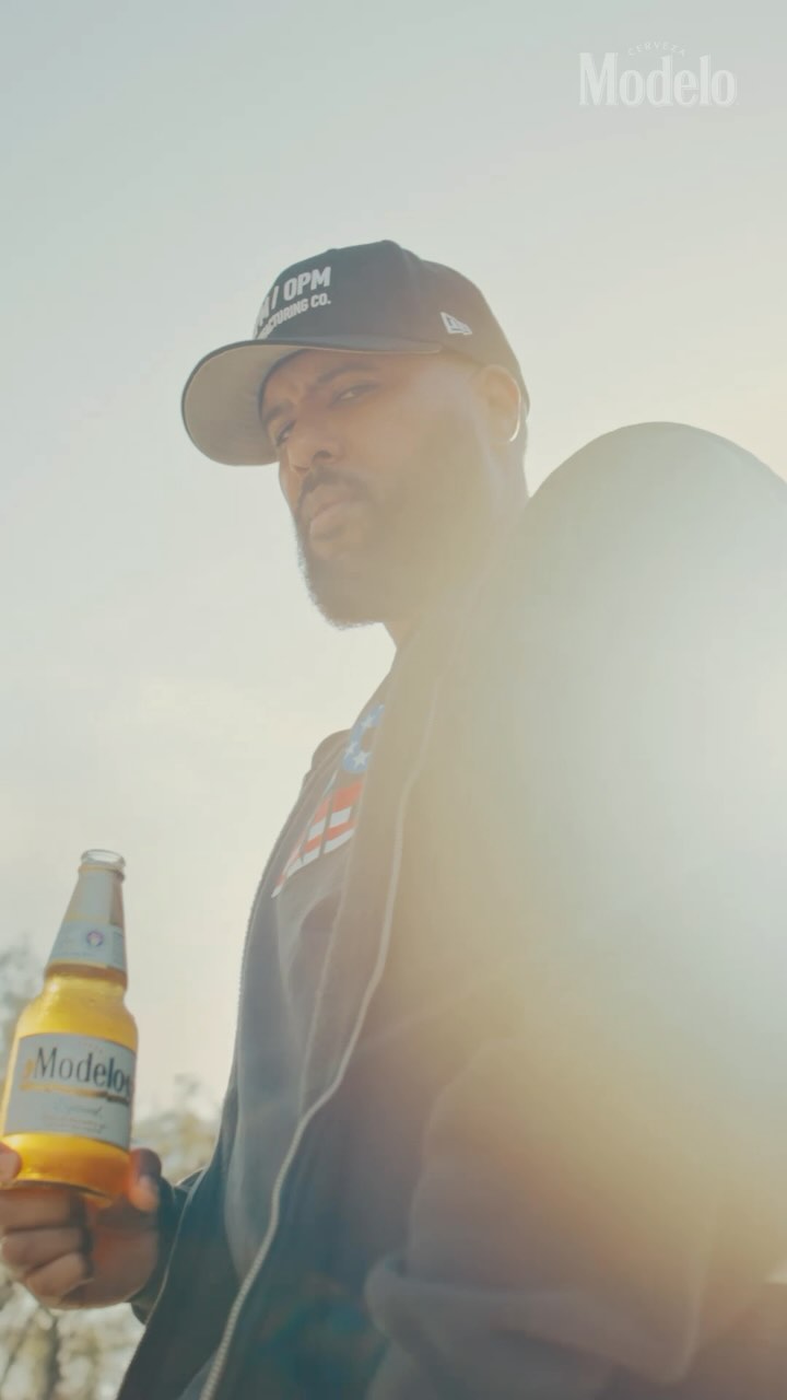Instagram post by @dopeitsdom for Modelo Usa. Caption reads: The wait is over! @modelousa teamed up with....