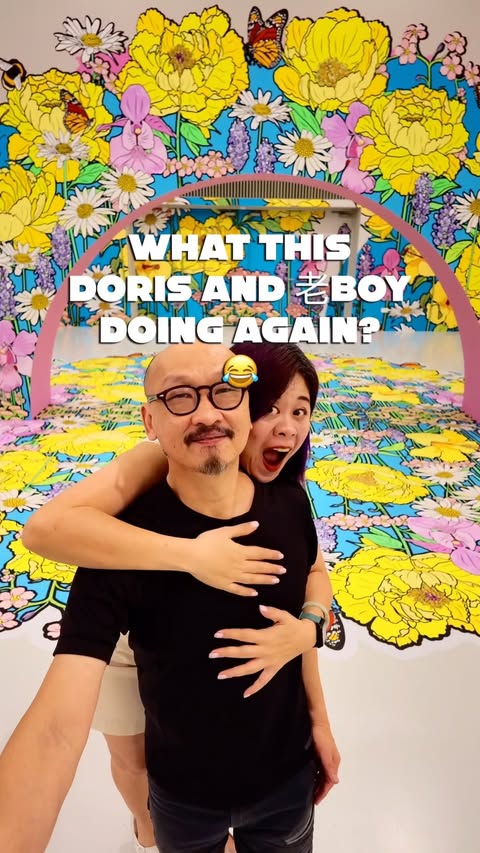 Instagram post by @doris.is.me for Your Singapore Guide. Caption reads: WHAT THIS DORIS & 老BOY DOING AGAIN? 😂🌸 Came to....