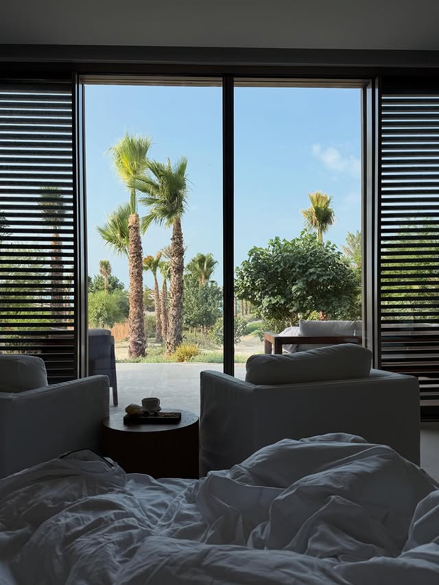 Instagram post by @falghazzawi for Nanushka. Caption reads: Off to the sea side 🐚 

@editionhotels ....