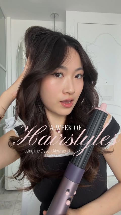 Instagram post by @cloiey for Dyson. Caption reads: A week of hairstyles in NYC using the @dyson_anz....