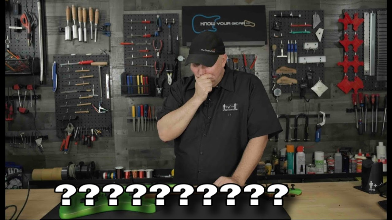 YouTube post by @therealPhillipMcKnight for Reverb. Caption reads: This Artist Signature Guitar Has A Design Flaw.