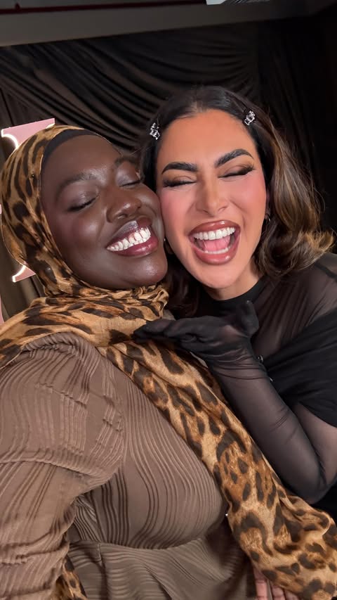 Instagram post by @huda for Huda Beauty. Caption reads: [...] no borders.❤️ #invitedby @hudabeauty.
