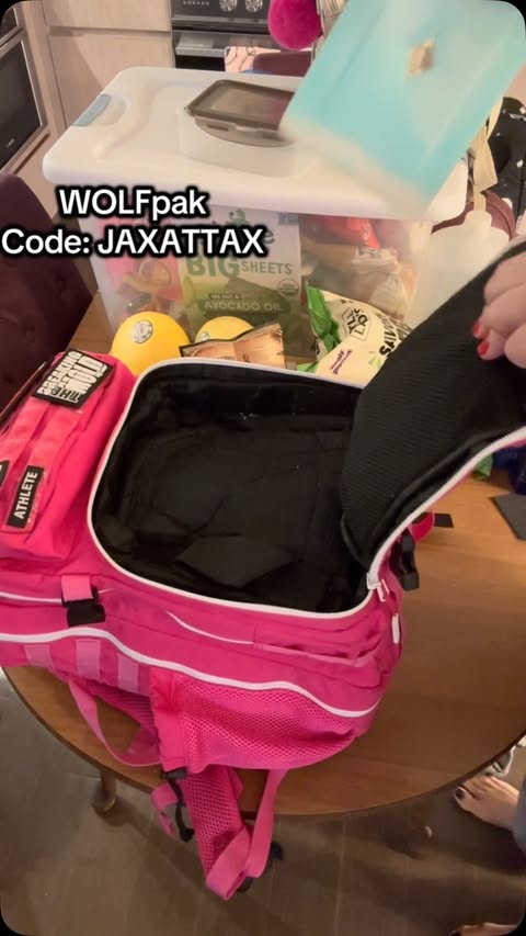 Instagram post by @jax_beausoleil for Wolfpak. Caption reads: [...] guns Use code JAXATTAX at check out!....