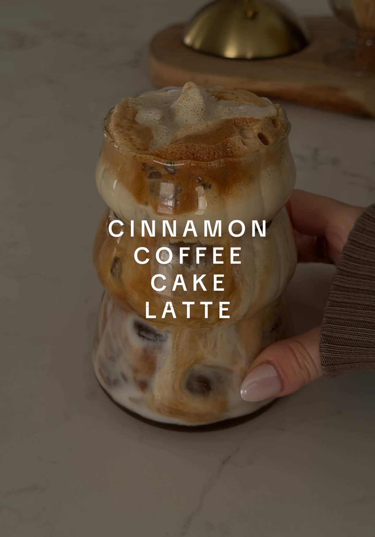 TikTok post by @kassiepetrocelli for Syruvia. Caption reads: [...] USA @Nespresso @nutpods @lovemysilk @Syruvia....