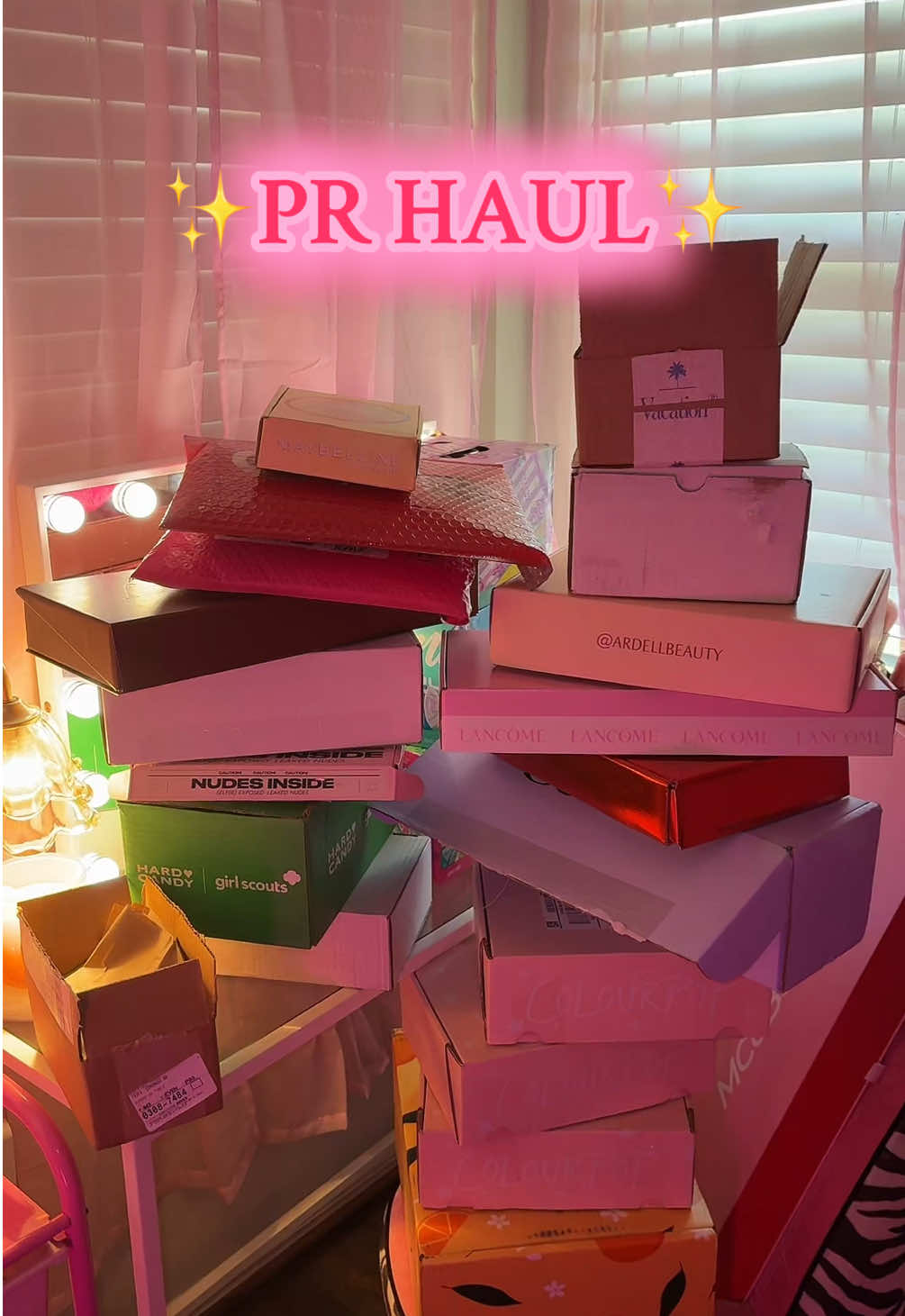 TikTok post by @playygirldom for Alani Nutrition. Caption reads: PR haul 💓 so so thankful to these brands and you....