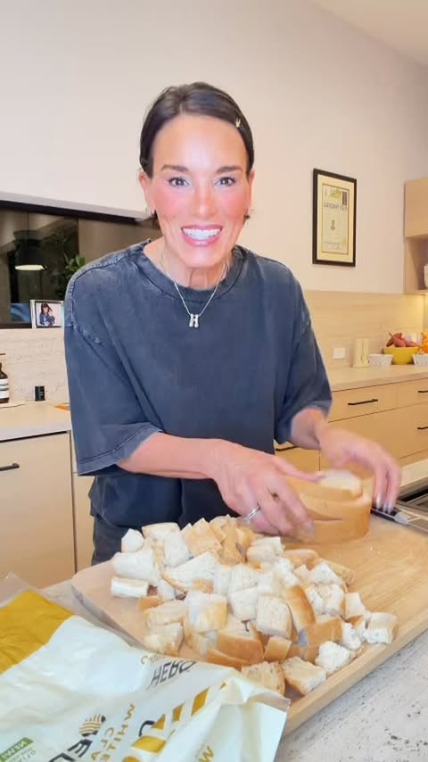 Instagram post by @heididamelio for Hero Bread. Caption reads: Here is what I really wear when I cook (referring....