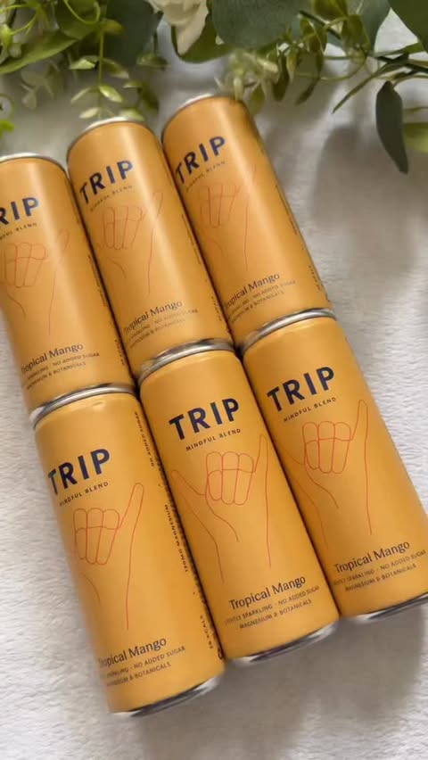 Instagram post by @testandreview2024 for TRIP. Caption reads: [...] crushing on Tropical Mango from @trip.drinks....