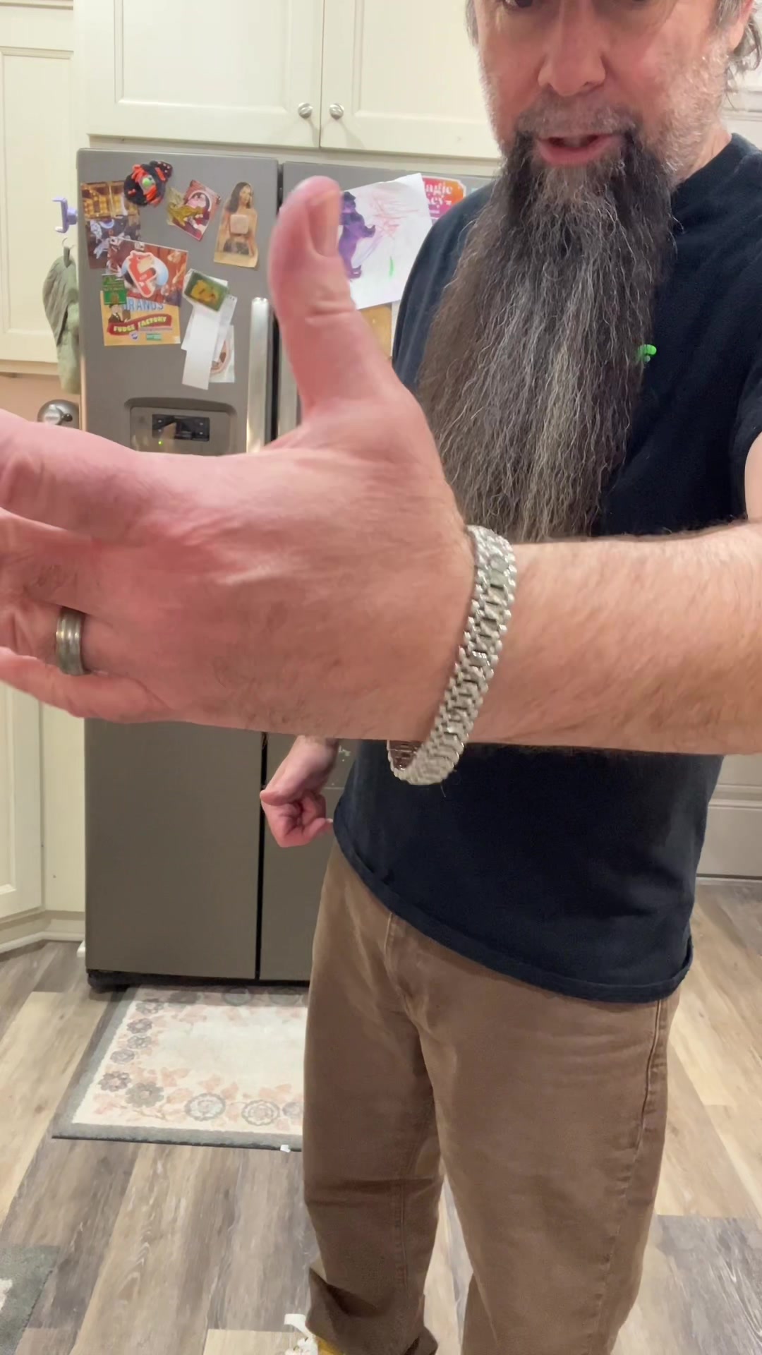 TikTok post by @worthabuck for FaithHeart Jewelry. Caption reads: Men’s stainless steel @FaithHeart Jewelry link....