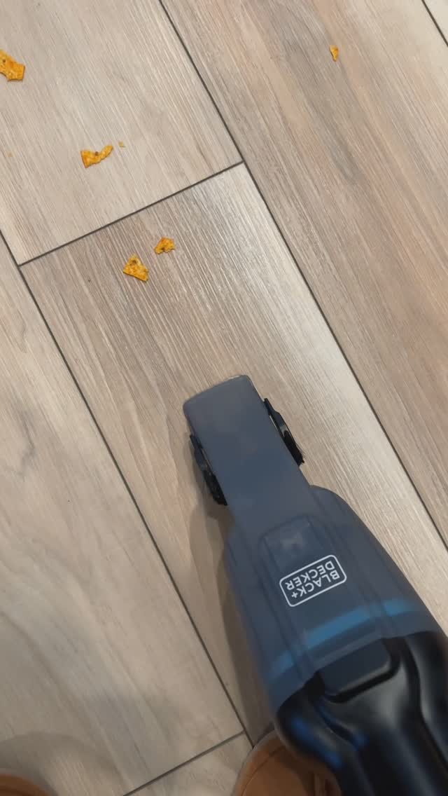 Instagram post by @organizedchaos4_audrey for BLACK+DECKER. Caption reads: Putting this hand vac in the kitchen has been my....