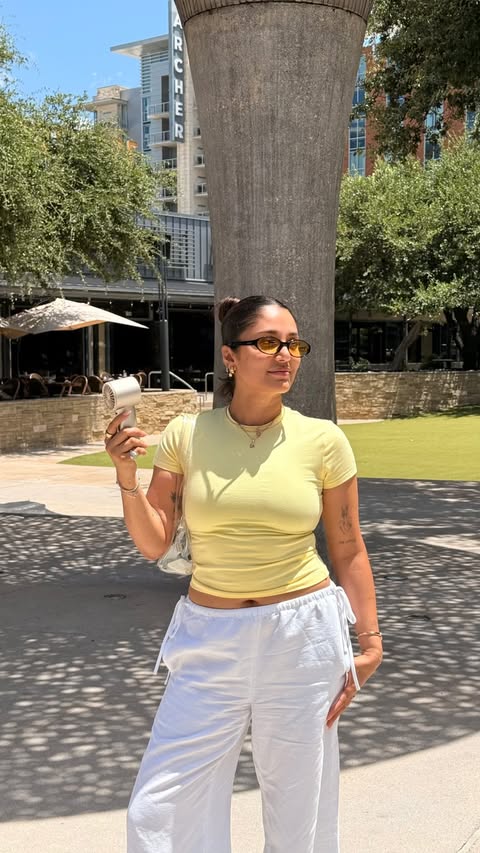 Instagram post by @kp.fitstyle for JisuLife. Caption reads: Summer in Texas is trying me but my JISULIFE....
