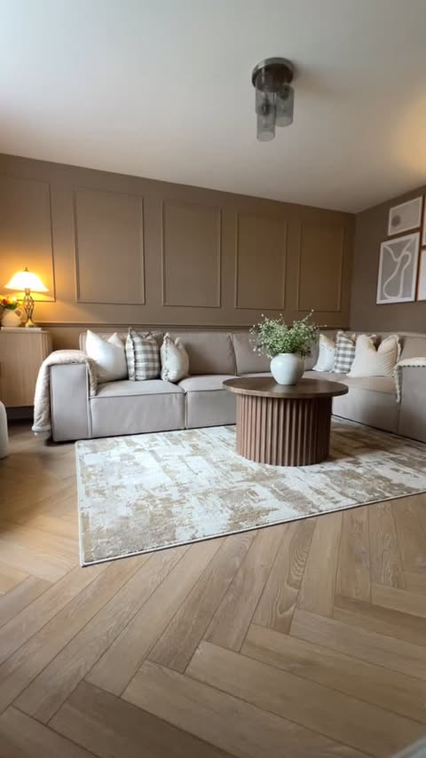 Instagram post by an influencer for Brit Floors. Caption reads: [...] ‘Desert Oak’ laminate from @britfloors [AD]....