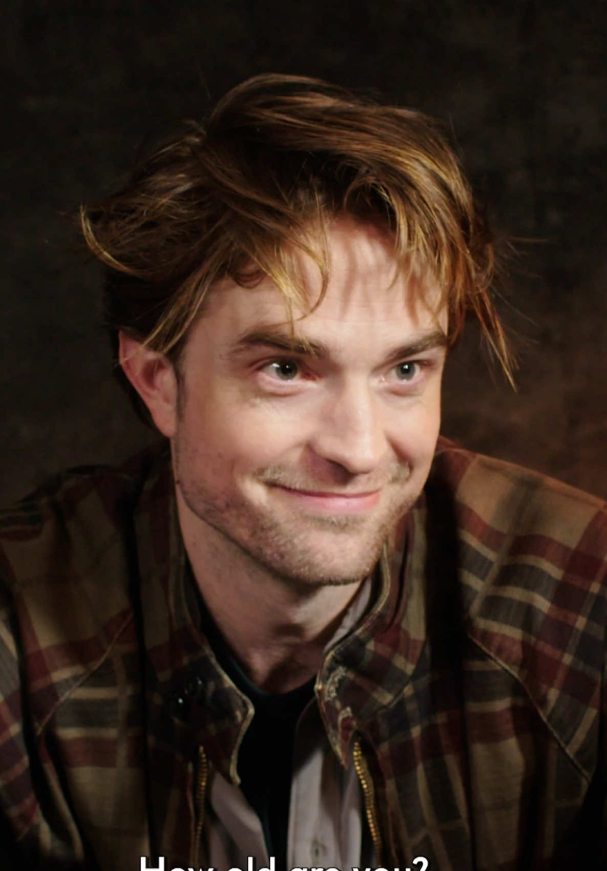 TikTok post by @vanityfair for MUBI. Caption reads: #RobertPattinson? Gen Z. The year he was born?....