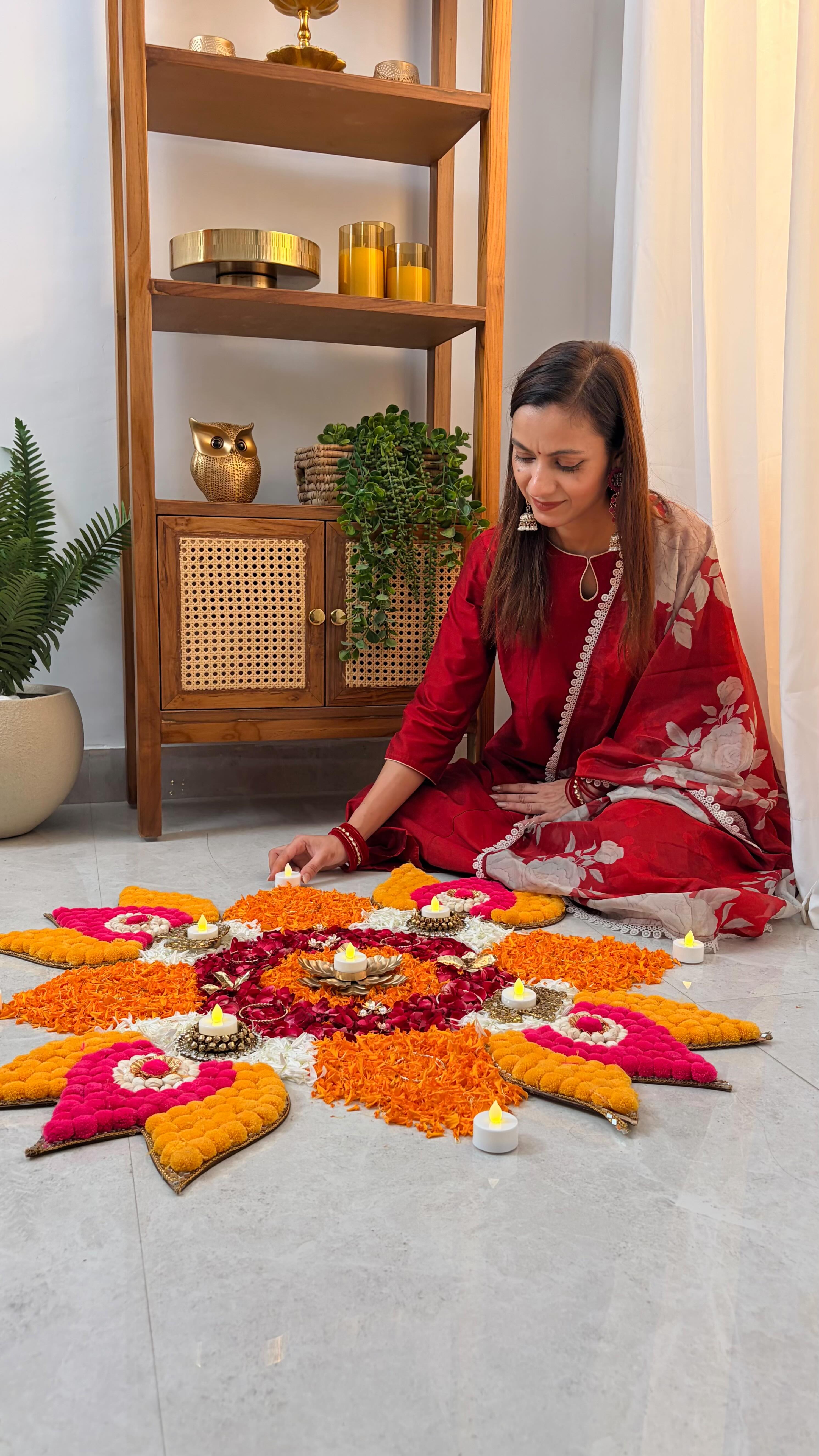 Instagram post by @thebloomdesignerr for Pantaloons. Caption reads: A simple floral rangoli can be so much more with....