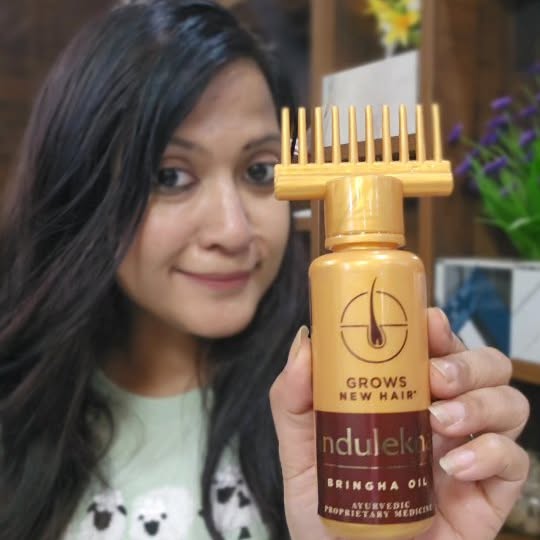 Instagram post by @madhumita_magic for Indulekha. Caption reads: Prep your hair for the festivities with Indulekha....