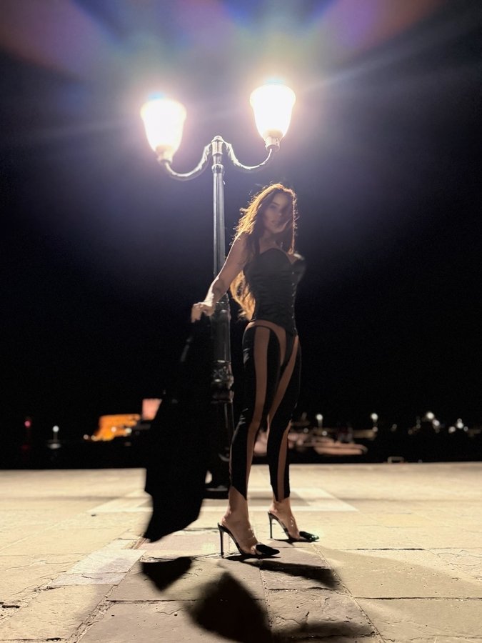 Instagram post by @nihan_ozelgil for Mugler. Caption reads: Confidence, defined by @muglerofficial 

#Mugler....