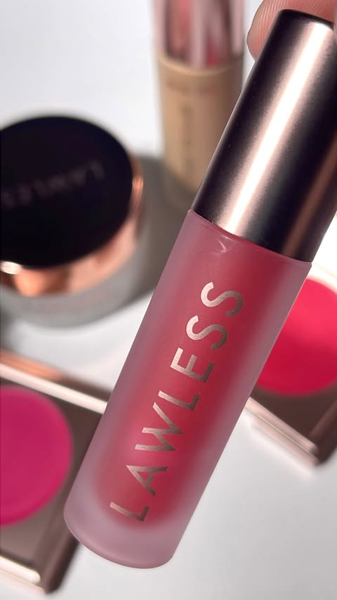 Instagram post by @leslovesbeauty for LAWLESS. Caption reads: [...] lip gloss - you will always find @lawless....