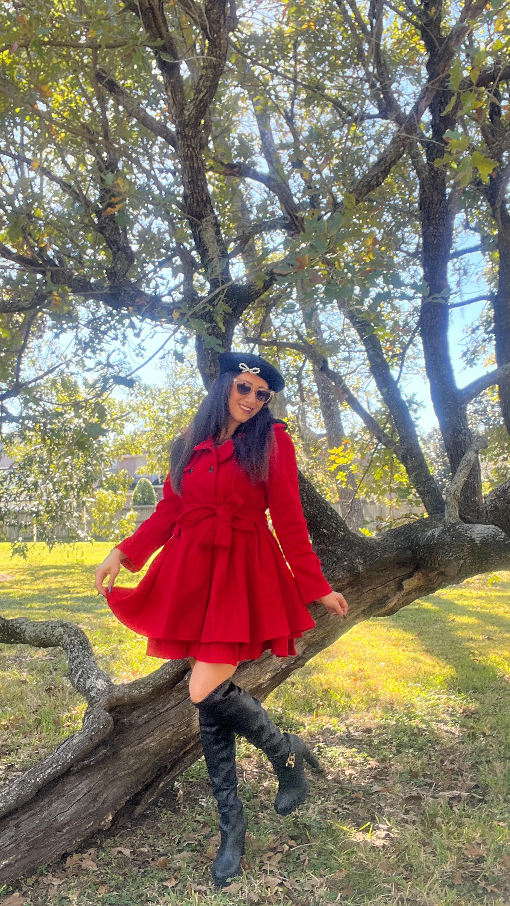 Instagram post by @sparkleshinedecor for Retro Stage. Caption reads: ✨Feeling festive in my red RetroStage coat!✨....