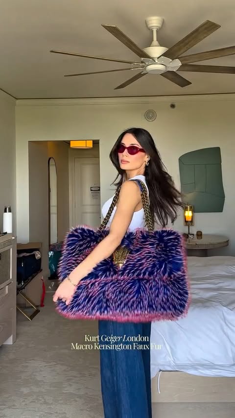 Instagram post by @georginamazzeo for Kurt Geiger. Caption reads: [...] your beauty bag? ✨ @lagencefashion....