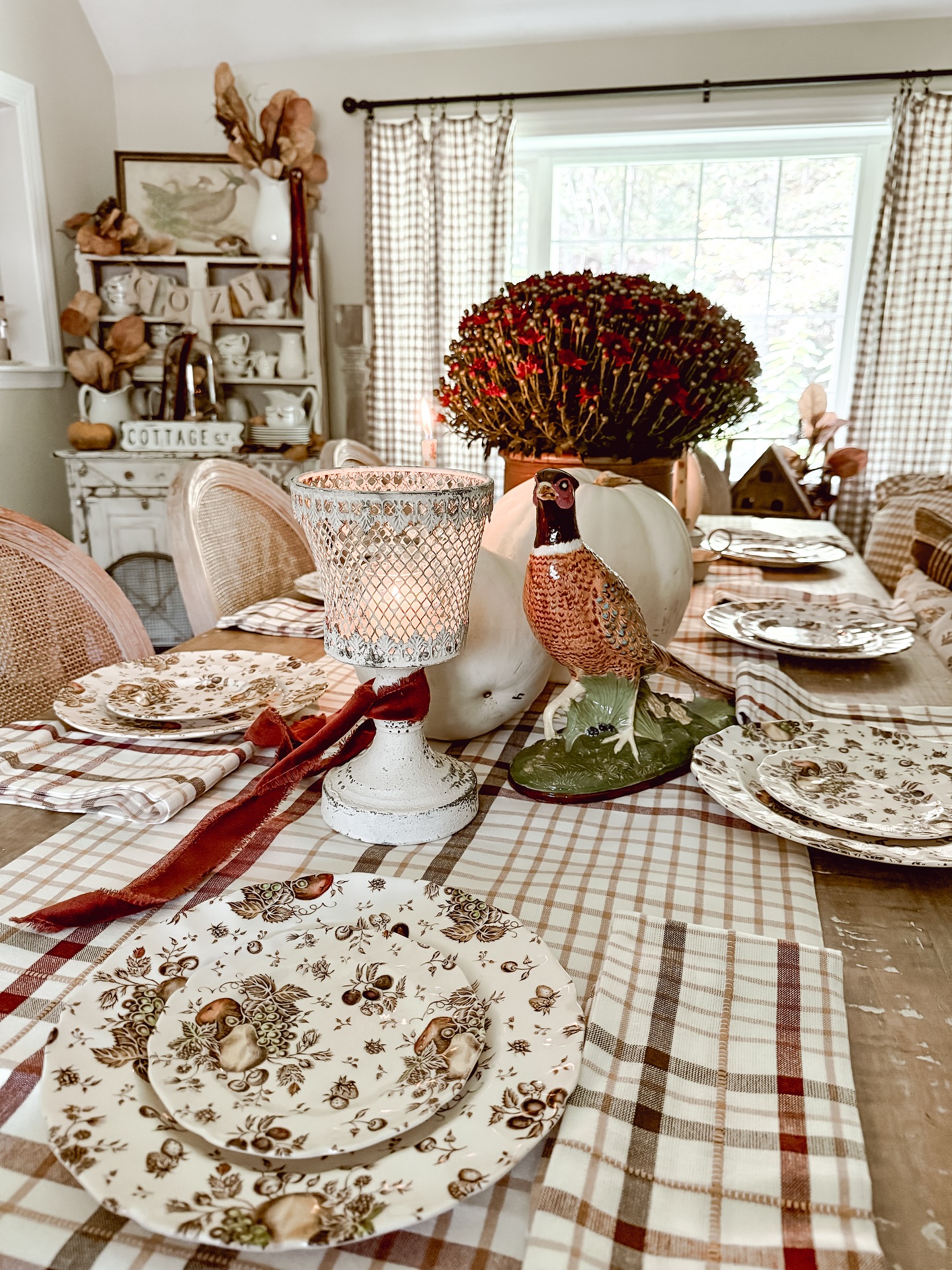 Instagram post by @our.cozy.little.home for Cottages & Bungalows Magazine. Caption reads: I had to share some stills of the cozy Fall....