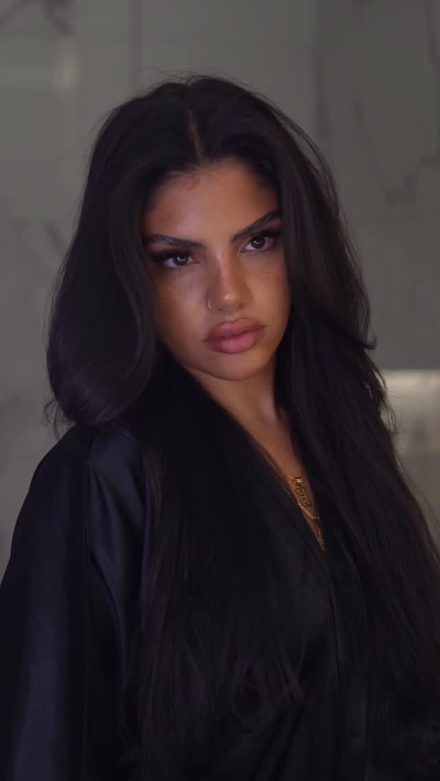 Instagram post by @hudabubbaaa for K18 Hair. Caption reads: [...] can handle the heat just like....