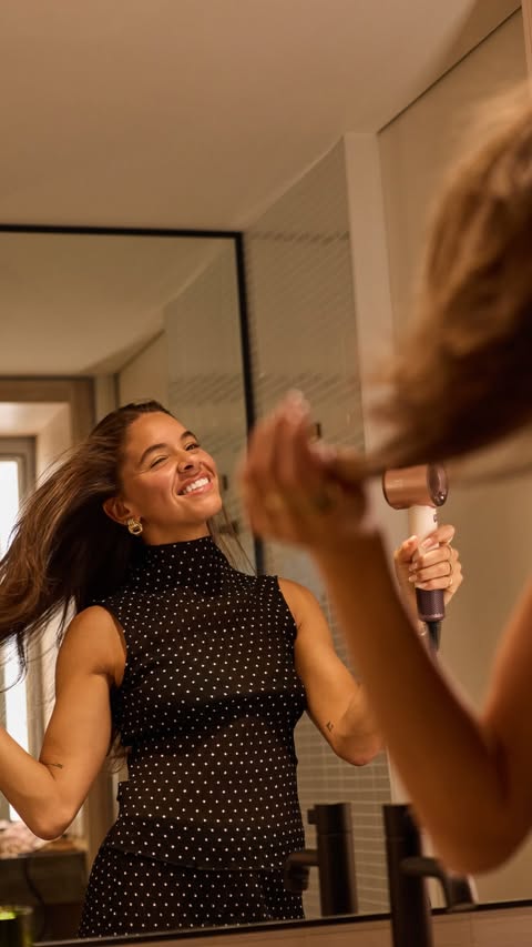 Instagram post by @livmcilkenny for Dyson Beauty. Caption reads: [...] report that we can finally pack our....
