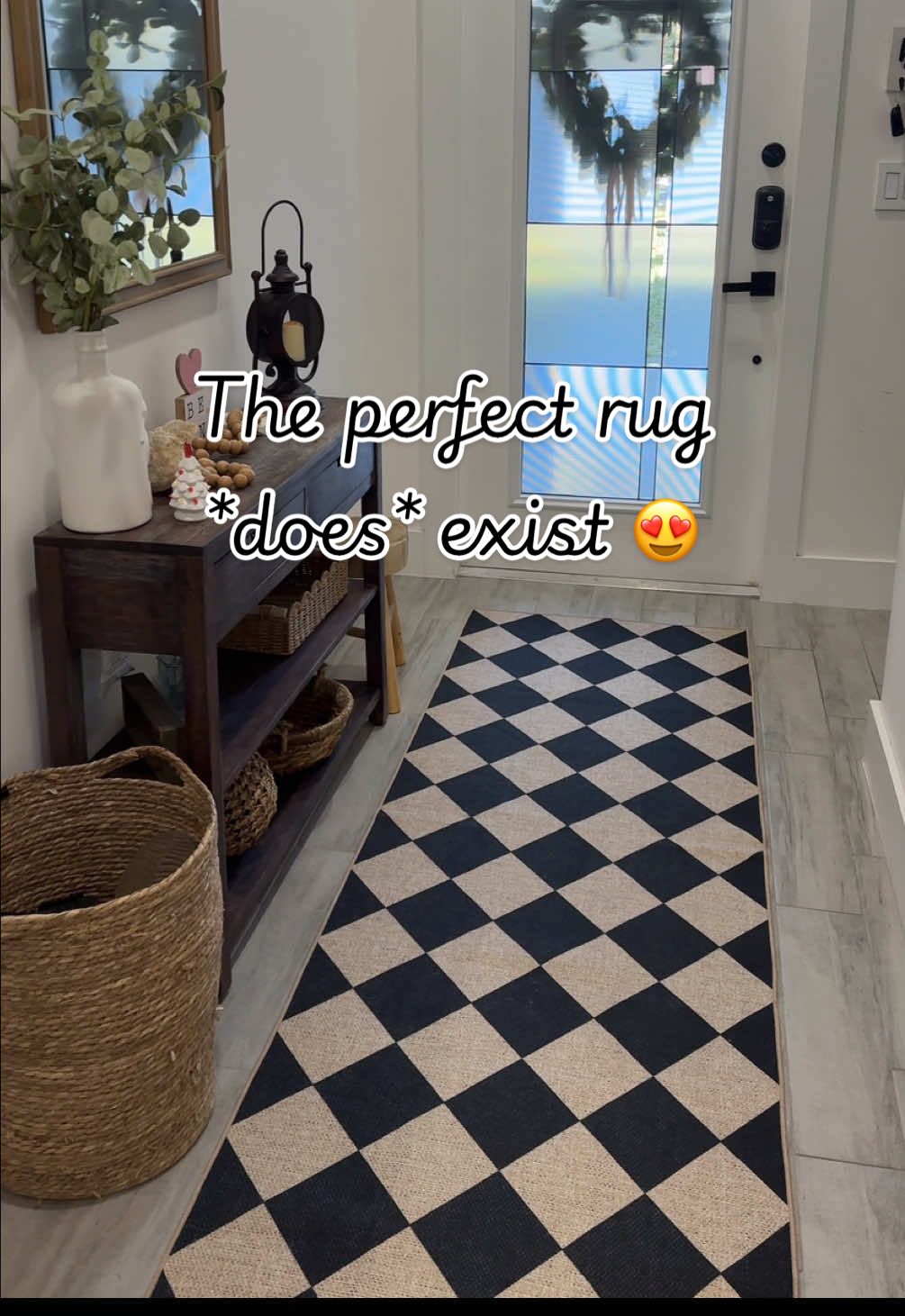 TikTok post by @mrs_beccaturner for LA Home Decor. Caption reads: The perfect addition! This checkerboard rug for my....