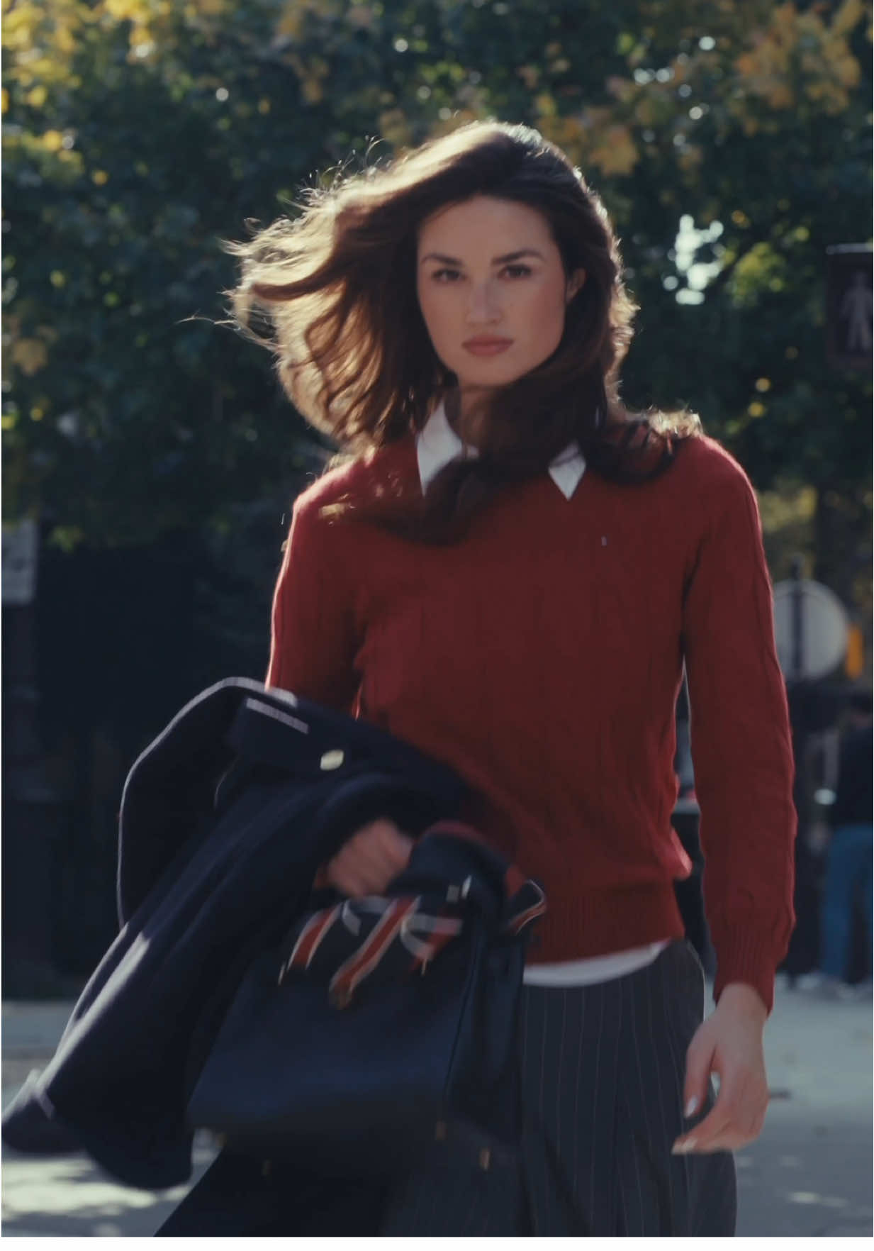 TikTok post by @angelinafrerk for Tommy Jeans. Caption reads: Anzeige / Paris, but make it @Tommy Hilfiger .